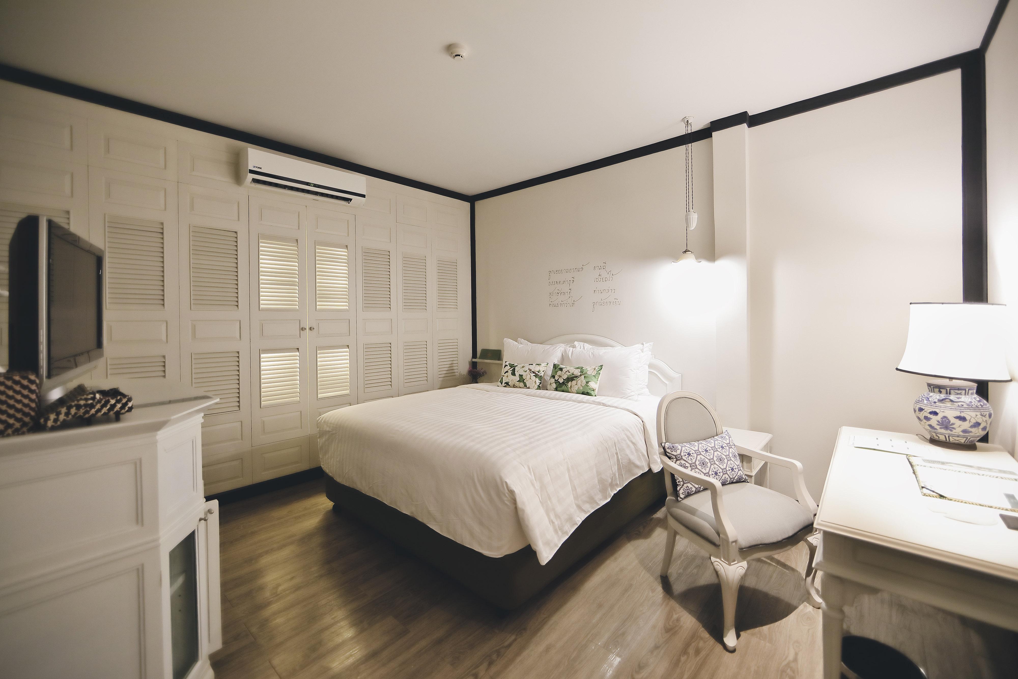 The Raweekanlaya Bangkok Kültér fotó A bedroom at the hotel